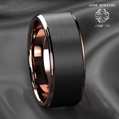 a black and rose gold wedding ring with a satin finish