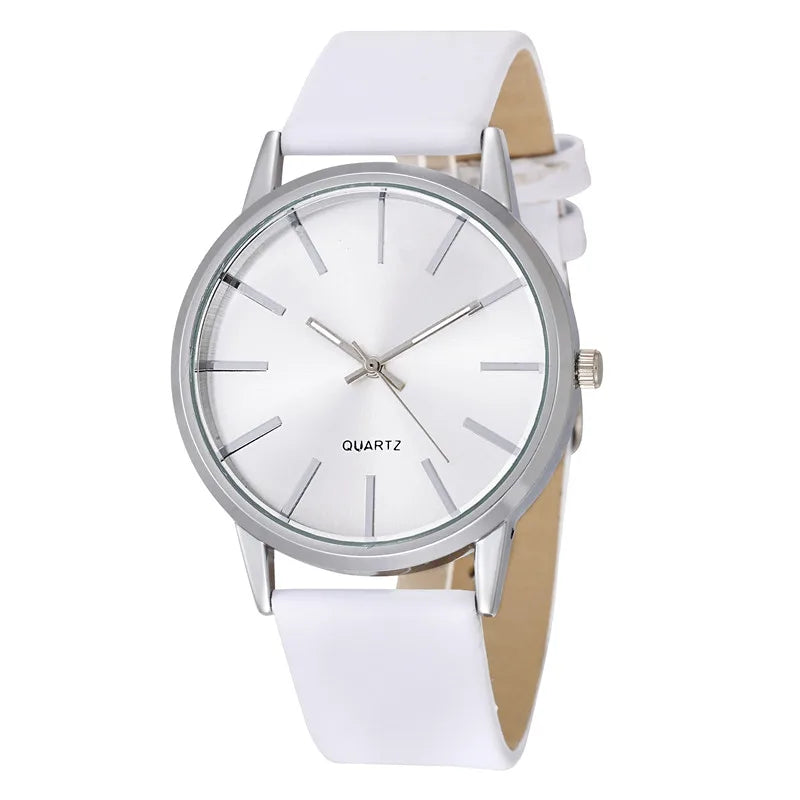 a white watch on a white background