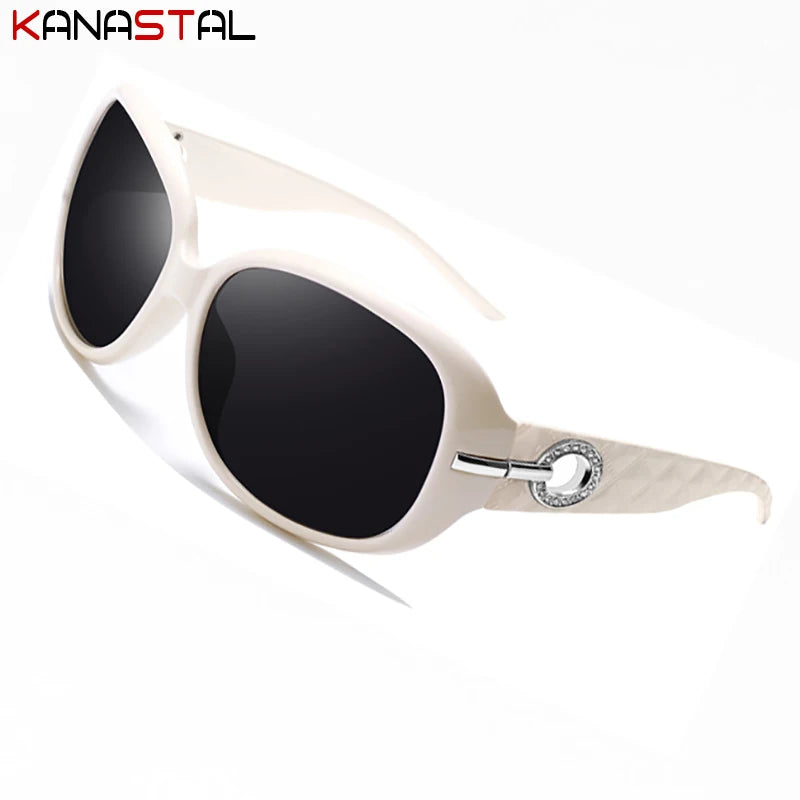 a pair of white sunglasses with black lenses